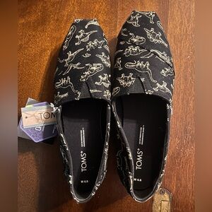 Glow in the dark Dino Toms. Size 6.5 women’s. Brand new with tags!